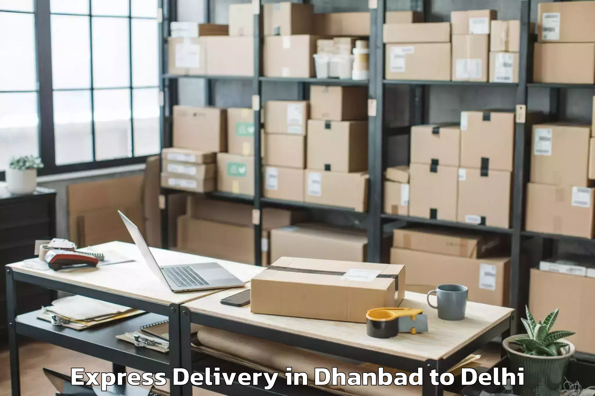 Dhanbad to Pacific Mall Tagore Garden Express Delivery